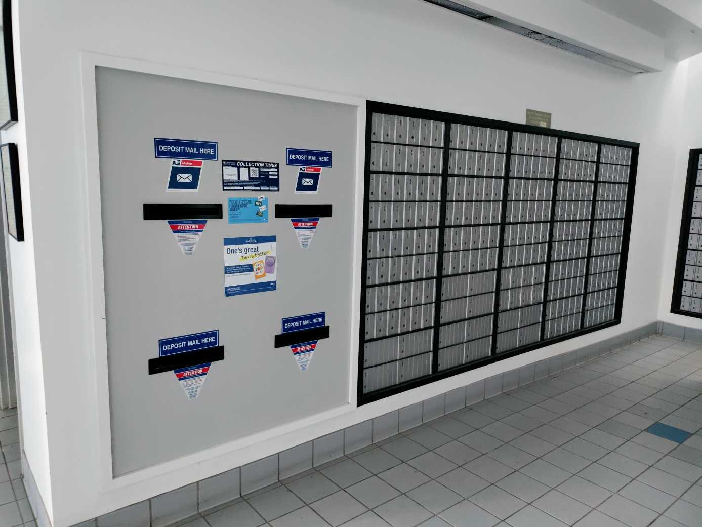 Indoor blue USPS mail collection box